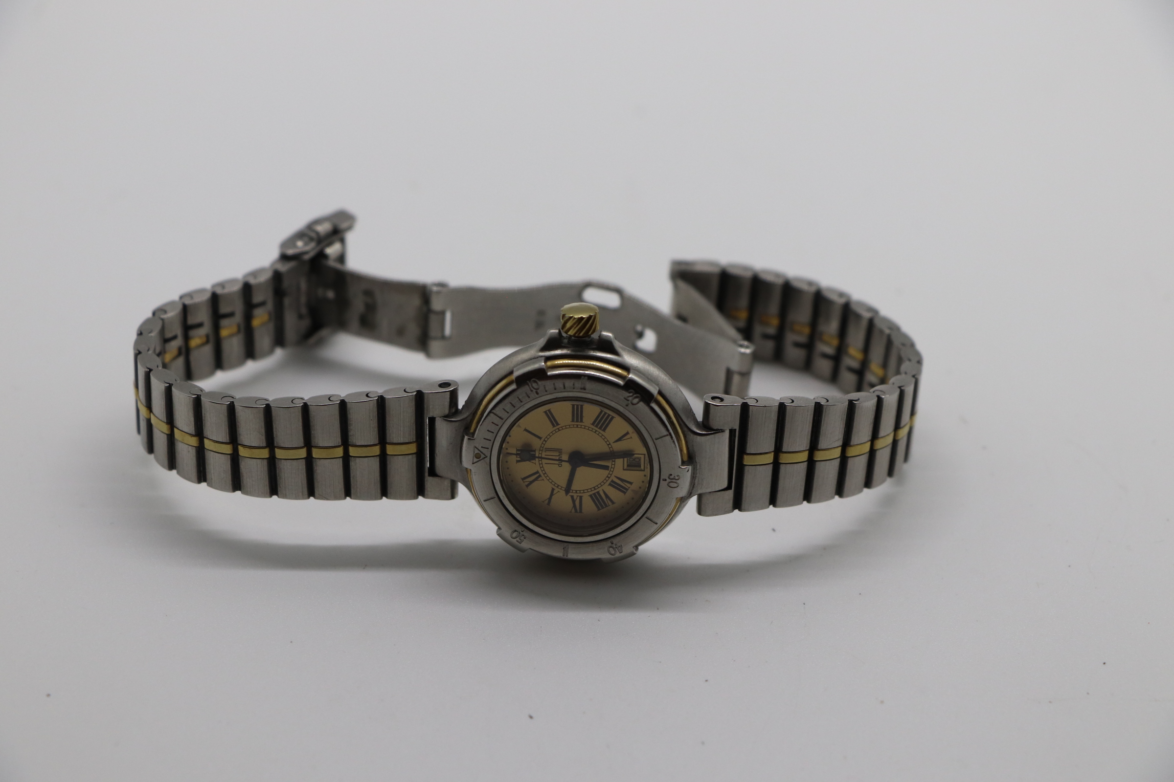 1990s Alfred Dunhill 'Facet' swiss quartz Date Wristwatch with White Dial on leather + Buckle